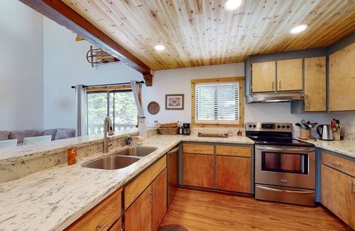 Tahoe Tyrol House | Rustic home with forest access, pool, hot tub, sauna, pool table, 2 fireplaces