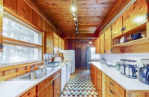 Harrison House | Rustic lakefront retreat with private beach, dock & large deck - dog-friendly