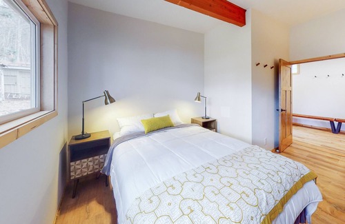 Harrison House | Rustic lakefront retreat with private beach, dock & large deck - dog-friendly