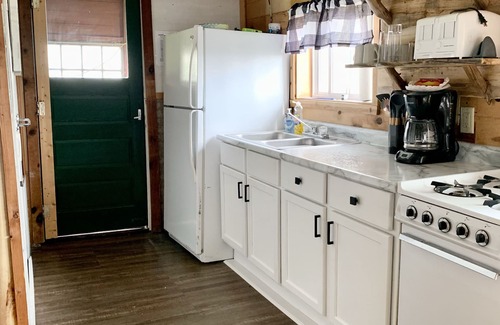 Garrison Resort | Rustic log cabin built in the 1900's! On Private Lake with Great Fishing.