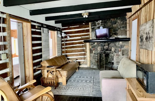 Garrison Resort | Rustic log cabin built in the 1900's! On Private Lake with Great Fishing.