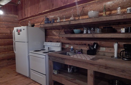 Greensboro Cabin | Rustic Log Cabin with fishing.