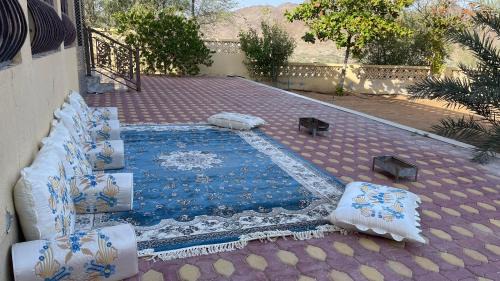 Sharjah House | Rustic Mountain Oasis