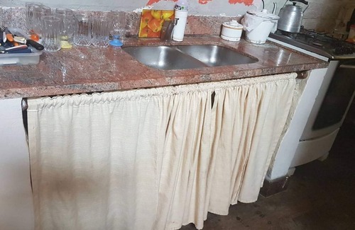 Sao Francisco de Paula House | Rustic Stone House in Condominium.