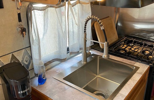 Pahrump Apartment | RV1 Camper privacy of your own with 50 amp EV charging outlet available.