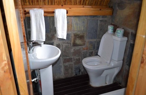 Western Province Cabin | Rwiza Village