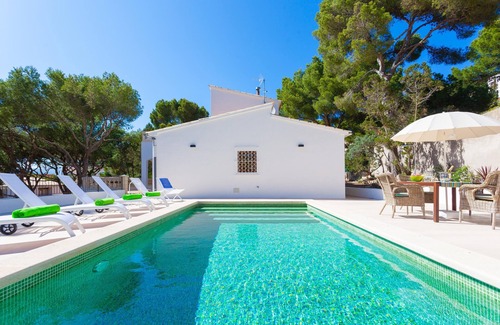 Cala Agulla House | Sa Torre Villa with pool very close to the beach and the town center.