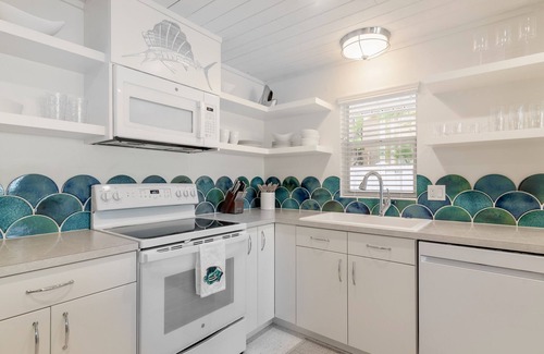 Whitney Beach Cottage | Sailfish Gulf Suites #1, Beachfront, Steps to the Sand