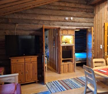 Syote House | Satu 31, kahden makuuhuoneen kelomökki Syötteellä, valaistun ladun vieressä