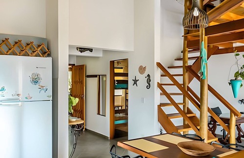 Tesouro da Colina Condo | Sea view and comfort in Ilhabela