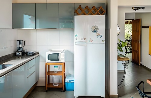 Tesouro da Colina Condo | Sea view and comfort in Ilhabela