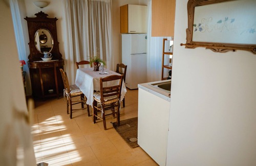 Mytilene Villa | Seafront Away-from-it-all Stone House in Sunset Olive Grove