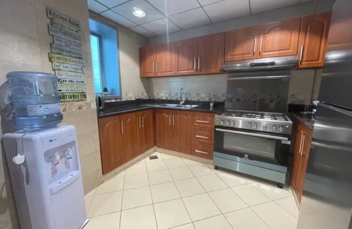 Rumailah Apartment | Seaside Gem – 2BR Beachfront Apartment