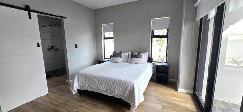 Calypso Beach House | Seaside Retreat in Langebaan with Hot Tub and BBQ