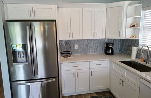 Oldsmar House | Seaside retreat on Upper Tampa Bay with dock and boat ramp.