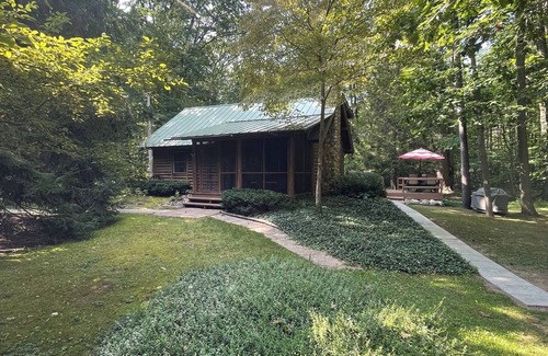 South Haven Cabin | Secluded Log Cabin with trail to North Point County Park to the beach.
