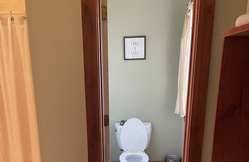 Woodville Cabin | Secluded & Private Cabin situated over stocked pond.