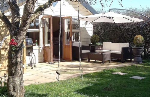 Stockton-on-Tees Cabin | Secluded timber cabin with private garden and wood fired hot tub.