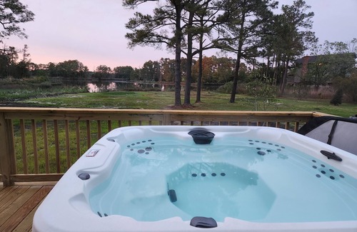 Marion Station House | Secluded waterfront getaway with hot tub,fire pit, and private dock.