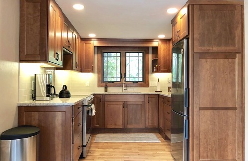 Beulah Apartment | Second floor unit close to downtown Beulah & Crystal Lake for year-round fun!