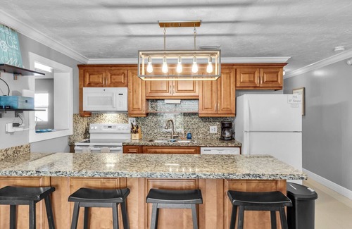 Key Colony Beach House | Seeking Paradise in the Keys? Dock for 35’ boat and pool & beach access included