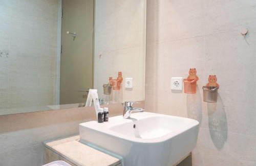 Pantai Indah Kapuk Apartment | Serene and Best Location 2BR Gold Coast Apartment By Travelio