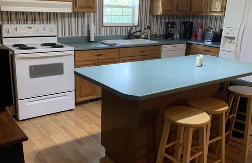 Sycamore House | Serene Getaway nestled in country, 4 bedroom 2 bath. Covered patio cooking area.