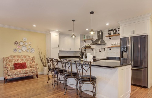 Dandridge Cabin | Serene lake views featuring a private dock, sun deck + spacious fire pit