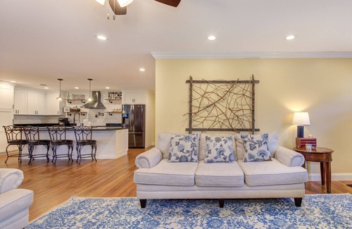 Dandridge Cabin | Serene lake views featuring a private dock, sun deck + spacious fire pit