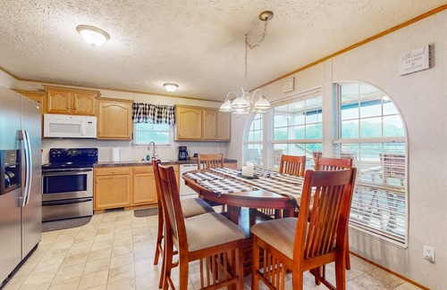 Delta House | Serene Lakeside Home with lake access access and fire pit