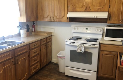 Greenwood House | Serenity House: 4 or 5 bedrooms, large patio, parking for work vehicles.