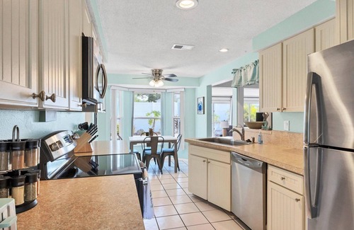 Whitfield House | Settle Down in Sarasota-tropical retreat with salt water in-ground pool