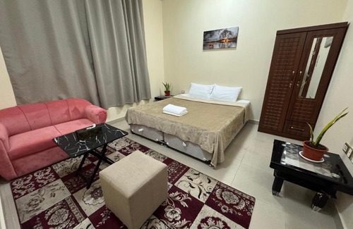 Al Ain House | Shared bath rooms only