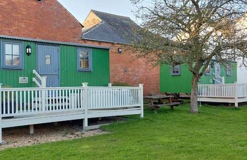 Wigton Cottage | Shepherds hut with hot tub and onsite bistro and gym close to Hadrian's Wall and beach.