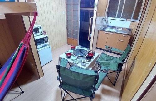 Minato Apartment | Short distance to USJ and the planned Expo site. Wooden log house style room 1F