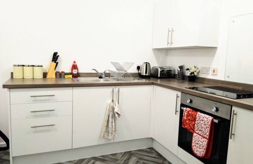 North Shields Apartment | Sigma Executive Flat 1 is 5 minutes away from the famed Fish Quay, near NS Town.