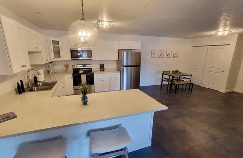 Kellogg Condo | SilverStrike Condos Unit 3 Relaxing porch, central location, washer/dryer.