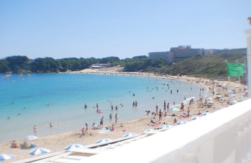 Arenal d'en Castell House | Since June 26. Touch the sea with your fingers at your beach house!