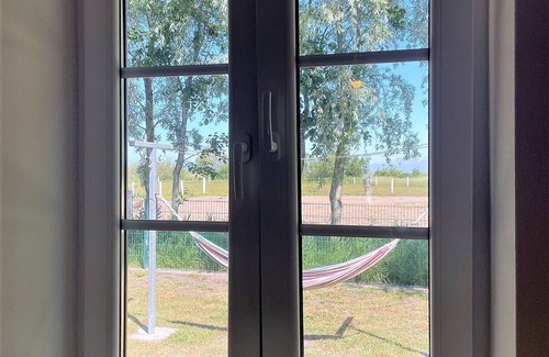 Neudorf House | Single-storey half of the house, dog wellness room, fireplace, fenced, modern, WLAN