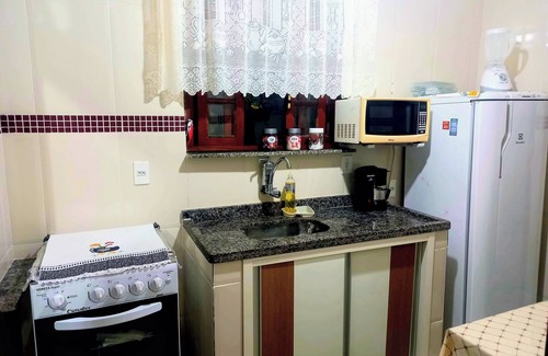 Rio das Ostras House | Single-story linear house with swimming pool in Atlântico.