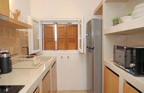 Ermoupoli House | Siroa Atrium | Stone & Light