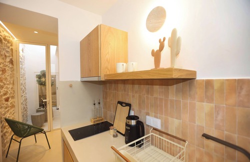 Ermoupoli House | Siroa Atrium | Stone & Light