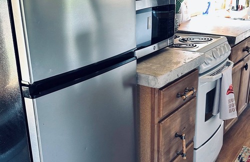 Sayre Cabin | Sleeper Train Car on the River! Campground Type Property. 100 acres!