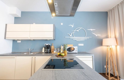 Bad Zwischenahn Apartment | SmartFewo: Fog greeting | lakeside terrace | sauna | park - Residence by the small sea