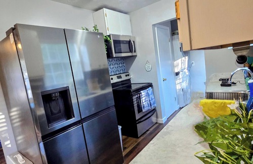 Arley House | Smith Lake Escape! Comfy, colorful, family friendly home. Private boat launch