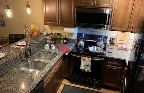 Snowshoe House | Snowcrest 1 Bedroom Condo . game room, hot tubs, & laundry in building