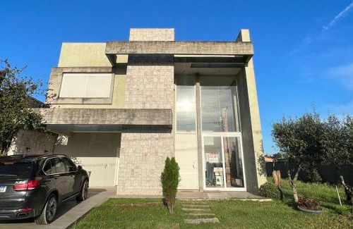 Capao da Canoa House | Sobrado Araçá