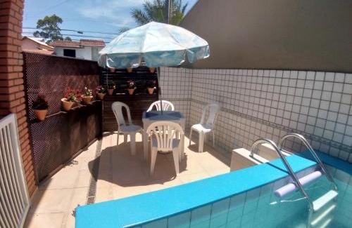 Caraguatatuba House | Sobrado com piscina em condomíno fechado a 150 M da praia