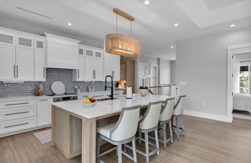 Coury House | Sophisticated 5-bedroom, elevator, 50' dock, heated pool/spa, sleep 12