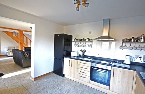 Pentney Cottage | South facing 4br lodge with Hot tub in 1/4 acre in tranquil setting.